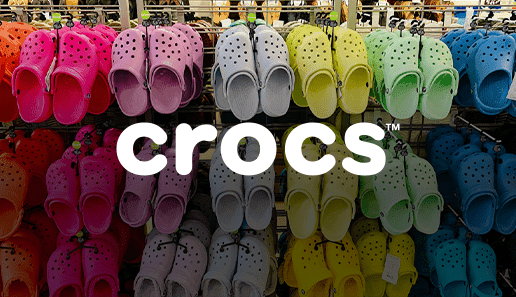 crocs logo overlay of a shopping rack of crocs